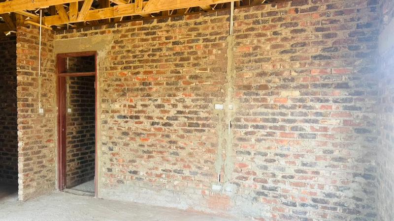 Interior brickwork and a door frame