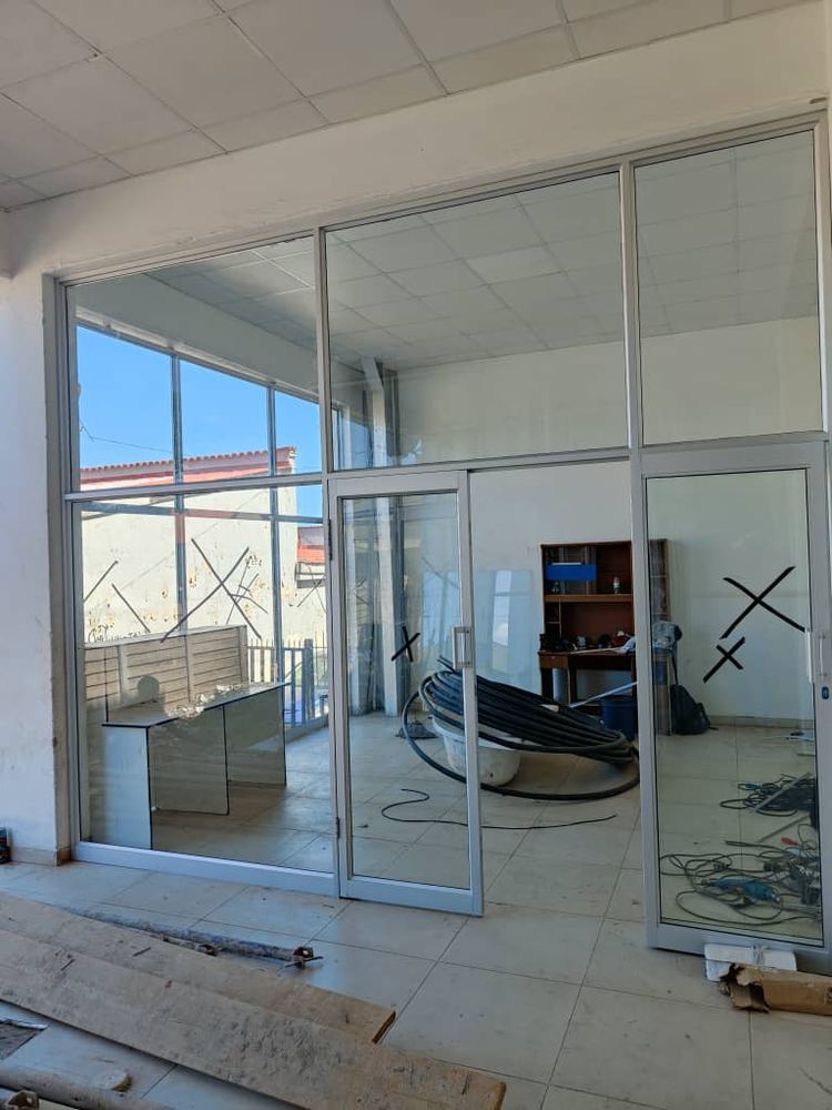 Aluminium and glass partition fit-out