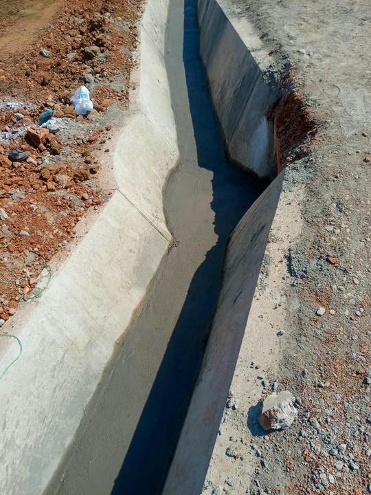Plastering a lined storm drain