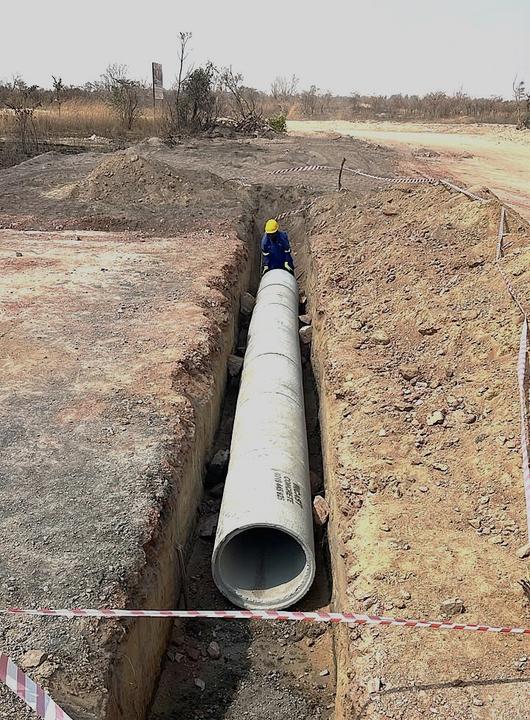 Laying a road crossing culvert