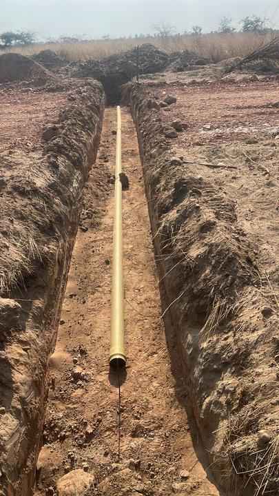 Sewer reticulation pipe laying