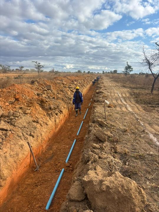 Bedding and laying the water main