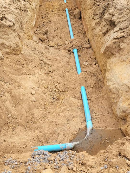 Water reticulation pipe laying in progress