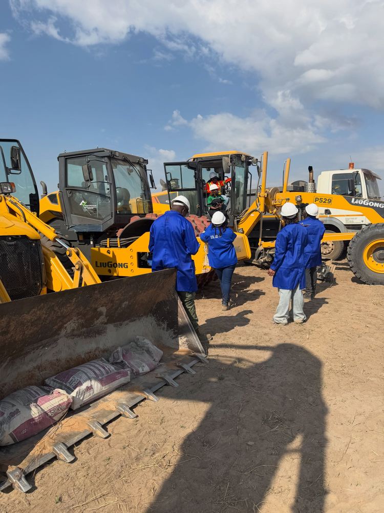 Loaders and crew on site
