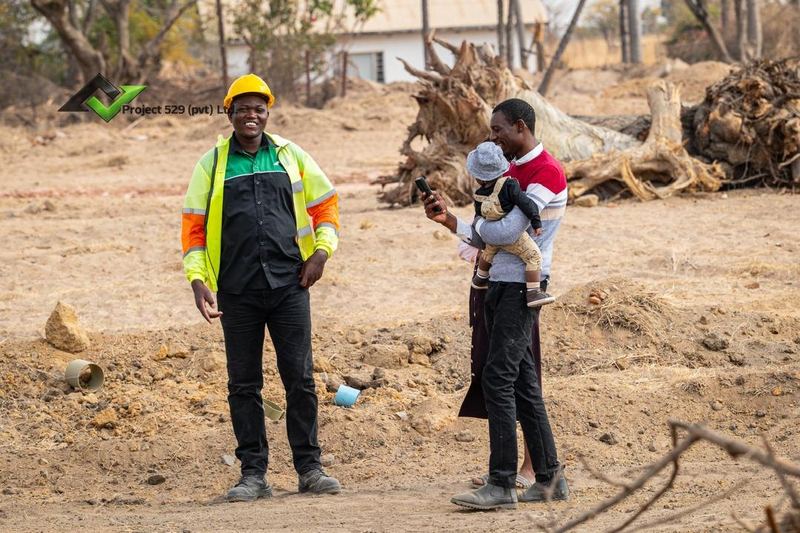 A family visiting the site with a member of our team
