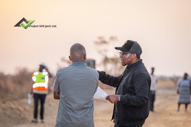 Talking through the plans at sunset