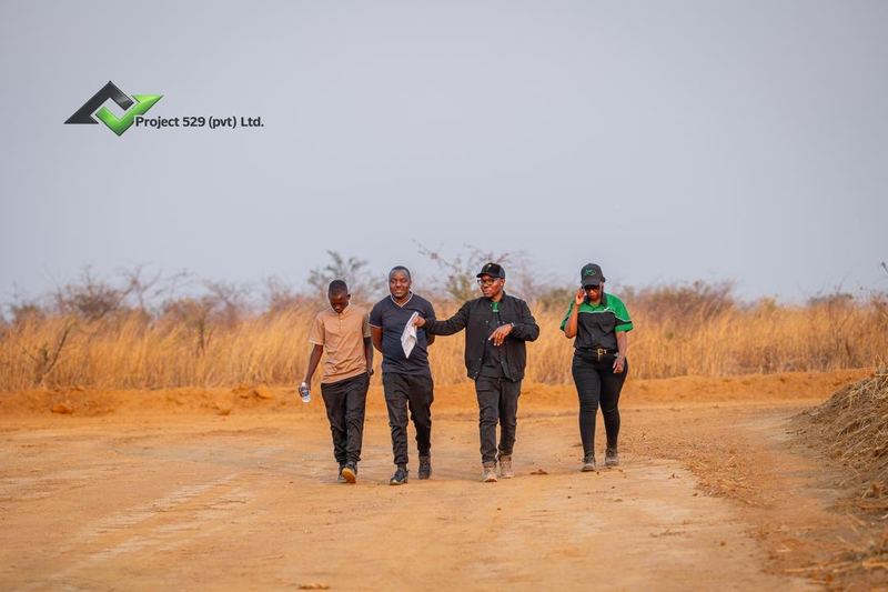 Our team and visitors walking the estate roads