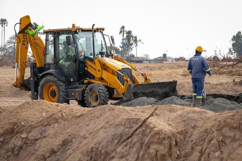 A Project 529 backhoe loader at work