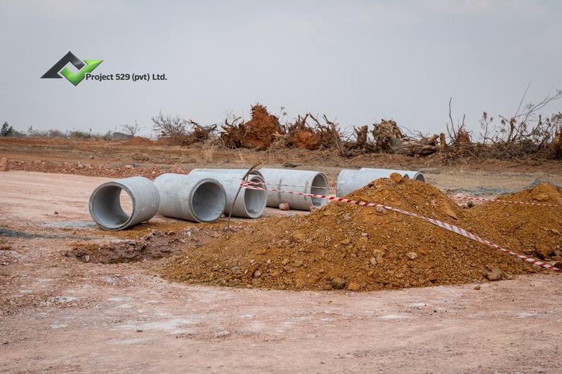 Concrete culvert pipes on site