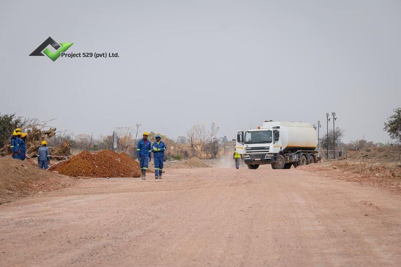 A water bowser on the new roads